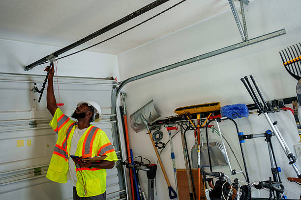 Professional Garage Door Panel Replacement technician working in Van Meter, IA